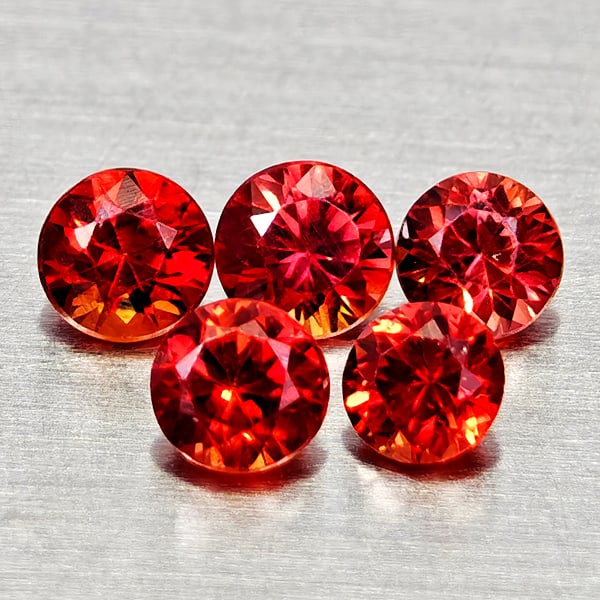 Natural Red Sapphire 0.67 Ct. 5 Pcs. Round Diamond Cut 2.7 Mm. Gemstones From Tanzania: Product ID: 806162475 Product Name: Natural Red Sapphire Weight: 0.67 CT. Size: 2.7 x 2.7 x 2 MM. Shape: Round Diamond Cut Color: Orangish Red Clarity:VSI Luster: Good Gems Origin: Tanzania Treatment: