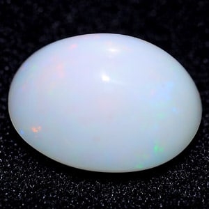 Natural Multi Color Opal 9.89 Ct. Oval Cabochon Shape 16.2 x 12.7 Mm Gemstone From Ethiopia: Product ID: 818708802 Product Name: Natural Opal Weight: 9.89 CT. Size: 16.2 x 12.7 x 10.4 MM. Shape: Oval Cabochon Color: Multi Color Clarity:Semi - Transparent Luster: Good Gems Origin: Ethiopia Tre