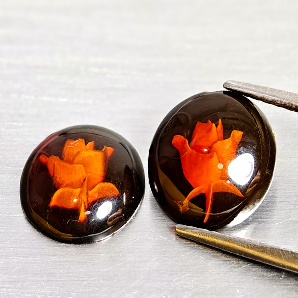 Natural Amber 1.37 Ct. 2 Pcs Flower Carving In Oval Cabochon Shape 10.3 x 8.8 Mm Gemstones: Product ID: 819091052 Product Name: Natural Amber Weight: 1.37 CT. Size: 10.3 x 8.8 x 2.8 MM. Shape: Oval Cabochon Color: Brown Yellow Clarity:Semi - Transparent Luster: Good Gems Origin: Poland Treat