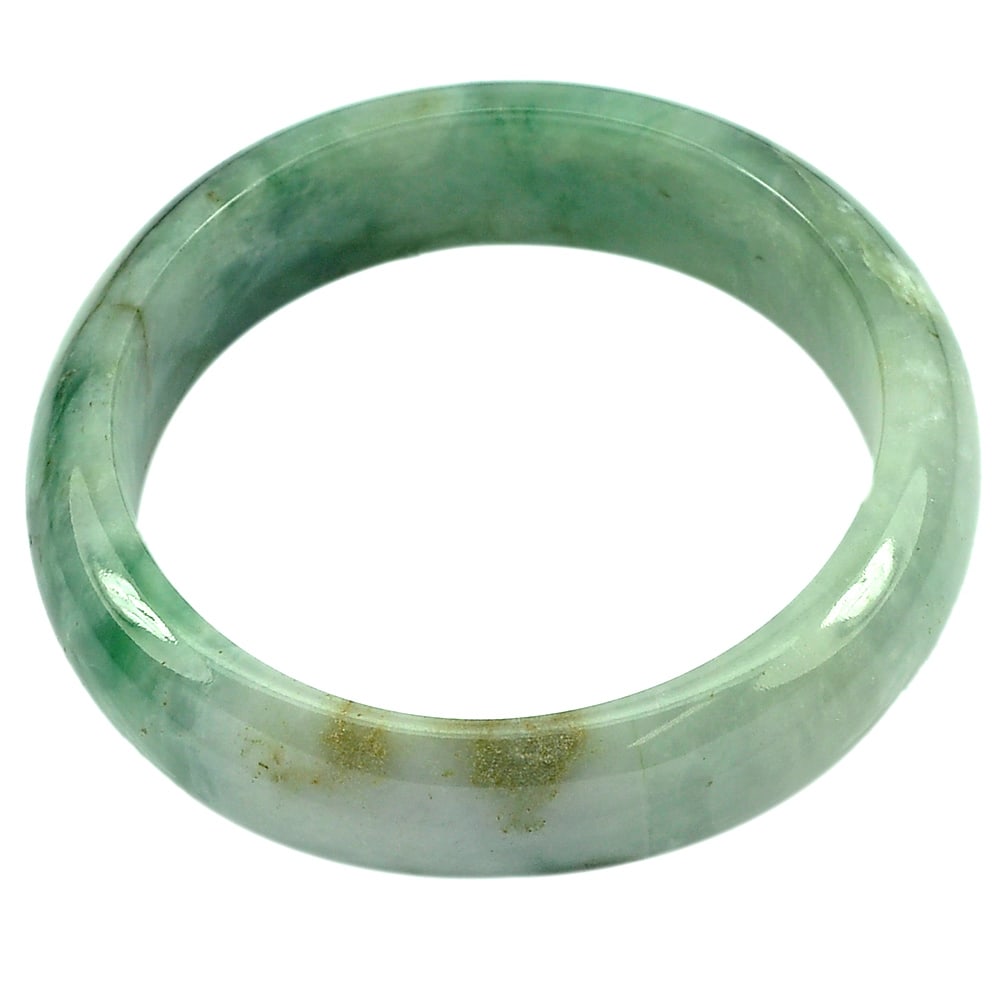 Natural Green Jade Bangle 335.59 Ct. Diameter 55 mm. Unheated Gemstone: Product ID: 819813507 Product Name: Natural Jade Weight: 335.59 CT. Size: 70 x 55 x 17 MM. Shape: Round Color: Green Clarity:Opaque Luster: Good Gems Origin: Thailand Treatment: Unheated Crystal Struc
