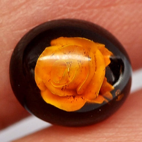Natural Amber 0.80 Ct. Flower Carving In Oval Cabochon Shape 9.5 x 8.4 Mm Gemstone From Poland: Product ID: 819004690 Product Name: Natural Amber Weight: 0.80 CT. Size: 9.5 x 8.4 x 4 MM. Shape: Oval Cabochon Color: Brown Yellow Clarity:Semi - Transparent Luster: Good Gems Origin: Poland Treatmen