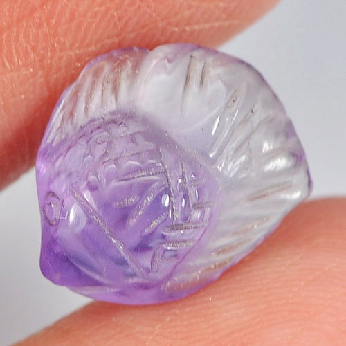 Purple Amethyst Fish Carving 3.95 Ct. Natural Gemstone Unheated: Product ID: 810303684 Product Name: Natural Amethyst Weight: 3.95 CT. Size: 13.1 x 10.9 x 5.7 MM. Shape: Fish Carving Color: Purple Clarity:Semi - Transparent Luster: Good Gems Origin: Brazil Treatmen