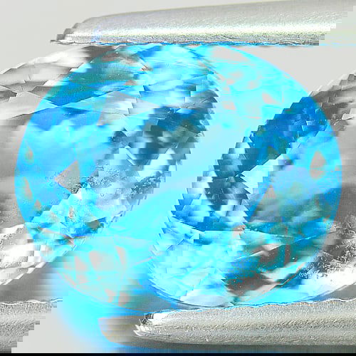 Natural Swiss Blue Topaz 3.52 Ct. Oval Shape 9.7 x 8.2 Mm Gemstone From Brazil: Product ID: 807155201 Product Name: Natural Blue Topaz Weight: 3.52 CT. Size: 9.7 x 8.2 x 5.7 MM. Shape: Oval Color: Swiss Blue Clarity:SI Luster: Good Gems Origin: Brazil Treatment: Treated Crystal S