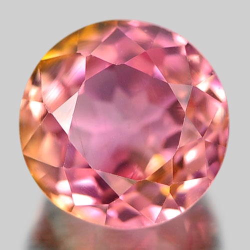 Natural Yellowish Pink Tourmaline 0.90 Ct. Round Shape 5.3 Mm. Unheated Gemstone From Nigeria: Product ID: 807244038 Product Name: Natural Tourmaline Weight: 0.90 CT. Size: 5.3 x 5.3 x 4 MM. Shape: Round Color: Multi-Color Clarity:VSI Luster: Very Good Gems Origin: Nigeria Treatment: Unheated C