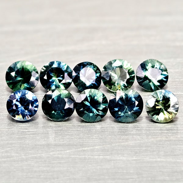 Natural Fancy Color Sapphire 0.90 Ct. 10 Pcs Round Diamand Cut 1.6 to 2.7 Mm Gemstones From Tanzania: Product ID: 806162199 Product Name: Natural Green Sapphire Weight: 0.90 CT. Size: 2.7 x 2.7 x 1.6 to 2.6 x 2.6 x 1.6 MM. Shape: Round Diamond Cut Color: Fancy Color Clarity:VSI Luster: Very Good Gems 