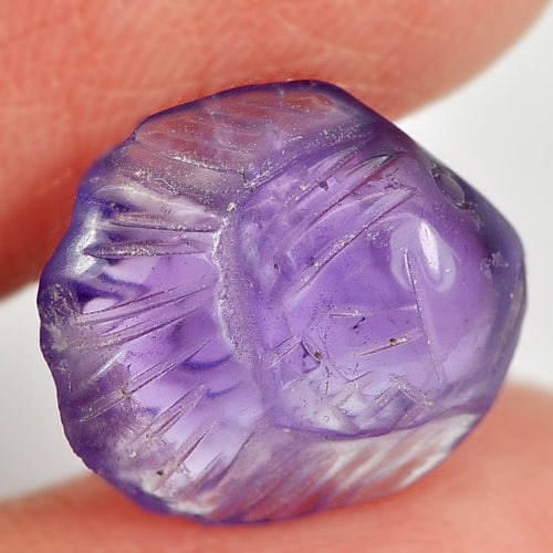 Natural Violet Amethyst 5.23 Ct. Fish Carving Size 13.7 x 12.2 Mm Gemstone From Brazil: Product ID: 810303656 Product Name: Natural Amethyst Weight: 5.23 CT. Size: 13.7 x 12.2 x 6 MM. Shape: Fish Carving Color: Violet Clarity:Semi - Transparent Luster: Good Gems Origin: Brazil Treatment: