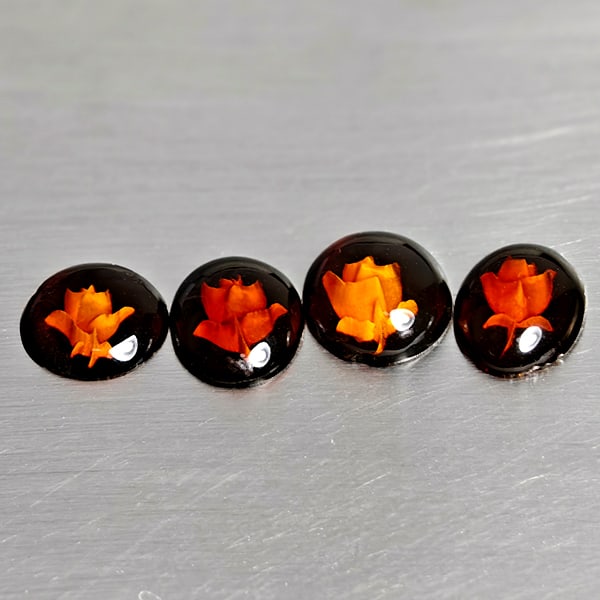 Natural Brown Yellow Amber 2.06 Ct. 4 Pcs Flower Carving In Mixed Cabochon Shape 9.6 x 7.4 Mm: Product ID: 819091032 Product Name: Natural Amber Weight: 2.06 CT. Size: 9.6 x 7.4 x 2.8 to 8.3 x 8.3 x 2.2 MM. Shape: Mixed Cabochon Shape Color: Brown Yellow Clarity:Semi - Transparent Luster: Good