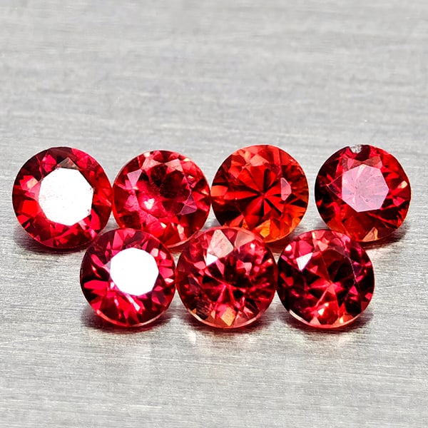 Natural Red Sapphire 0.55 Ct. 7 Pcs Round Diamond Cut 2.5 Mm. Gemstones From Tanzania: Product ID: 806162473 Product Name: Natural Red Sapphire Weight: 0.55 CT. Size: 2.5 x 2.5 x 1.9 MM. Shape: Round Diamond Cut Color: Orangish Red Clarity:VSI Luster: Good Gems Origin: Tanzania Treatmen