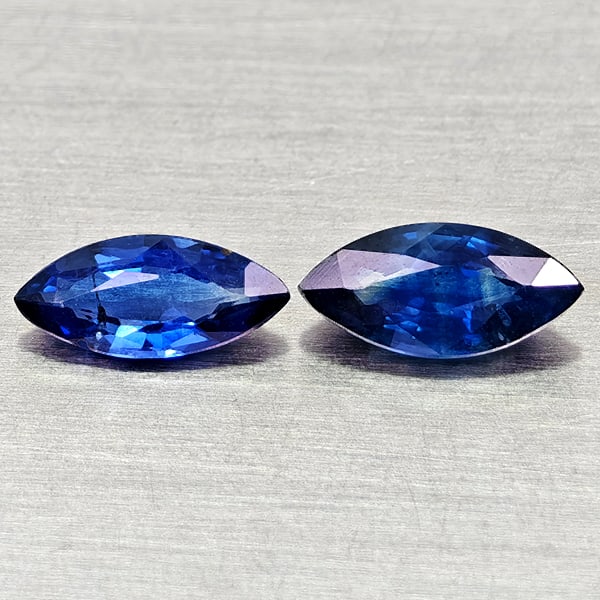 Natural Blue Sapphire 1.03 Ct. 2 Pcs Marquise Shape Gemstones from Thailand: Product ID: 806012105 Product Name: Natural Fancy Color Sapphire Weight: 1.03 CT. Size: 7.4 x 3.3 x 2.1 to 7.7 x 3.6 x 2.6 MM. Shape: Marquise Shape Color: Blue Clarity:VSI Luster: Good Gems Origin: T