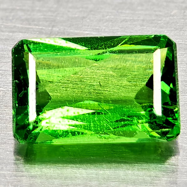 Natural Green Tsavorite Garnet 0.45 Ct. Octagon Shape 5.4 x 3.6 Mm Gemstone From Tanzania: Product ID: 803005039 Product Name: Natural Tsavorite Weight: 0.45 CT. Size: 5.4 x 3.6 x 2.2 MM. Shape: Octagon Color: Green Clarity:SI1 Luster: Good Gems Origin: Tanzania Treatment: Unheated Crystal
