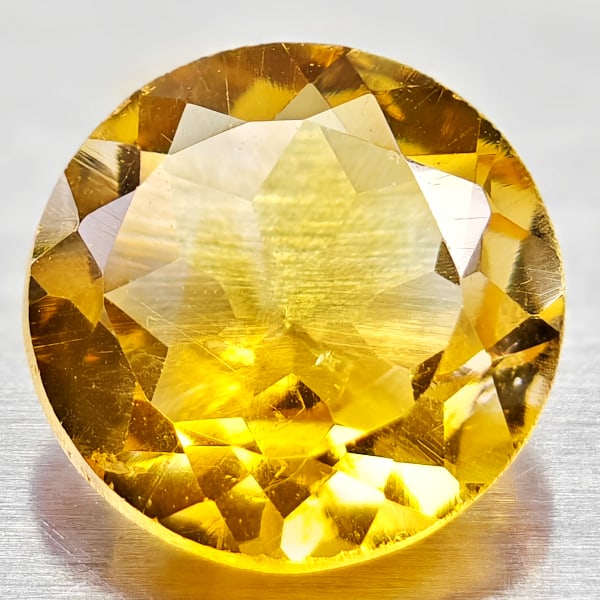 Natural Yellow Citrine 1.04 Ct. VVS Round Shape 7 Mm. Gemstone From Brazil: Product ID: 801813578 Product Name: Natural Citrine Weight: 1.04 CT. Size: 7 x 7 x 3.9 MM. Shape: Round Color: yellow Clarity:VVS Luster: Good Gems Origin: Barzil Treatment: Unheated Crystal Structure
