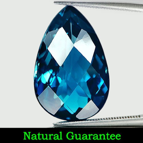 Natural London Blue Topaz 38.38 Ct. Clean Pear Checkerboard Cut 26 x 16.7 Mm. Gemstone From Brazil: Product ID: 807158516 Product Name: Natural Blue Topaz Weight: 38.38 CT. Size: 26 x 16.7 x 12 MM. Shape: Pear Checkerboard Color: London Blue Clarity:IF Luster: Very Good Gems Origin: Brazil Treatment