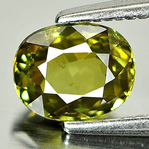 Natural Yellowish Green Demantoid Garnet 1.06 Ct. Oval Shape 6.4 x 5.2 Mm. Unheated Gemstone From: Product ID: 802931756 Product Name: Natural Demantoid Weight: 1.06 CT. Size: 6.4 x 5.2 x 3.4 MM. Shape: Oval Color: Green Clarity:SI1 Luster: Very Good Gems Origin: Madagascar Treatment: Unheated Crys