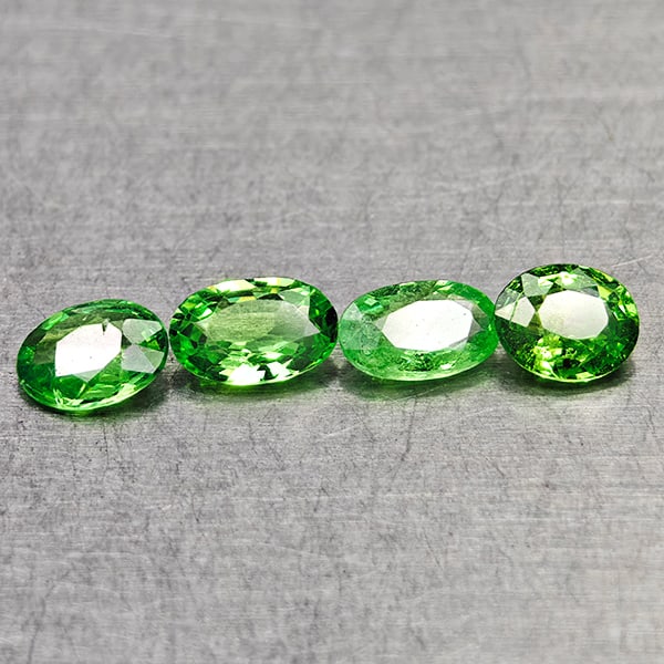 Natural Green Tsavorite Garnet 0.91 Ct. 4 Pcs Oval Shape 5 x 3.1 Mm Gemstones From Tanzania: Product ID: 803005004 Product Name: Natural Tsavorite Weight: 0.91 CT. Size: 5 x 3.1 x 1.9 MM. Shape: Oval Color: Green Clarity:VSI Luster: Very Good Gems Origin: Tanzania Treatment: Unheated Crystal