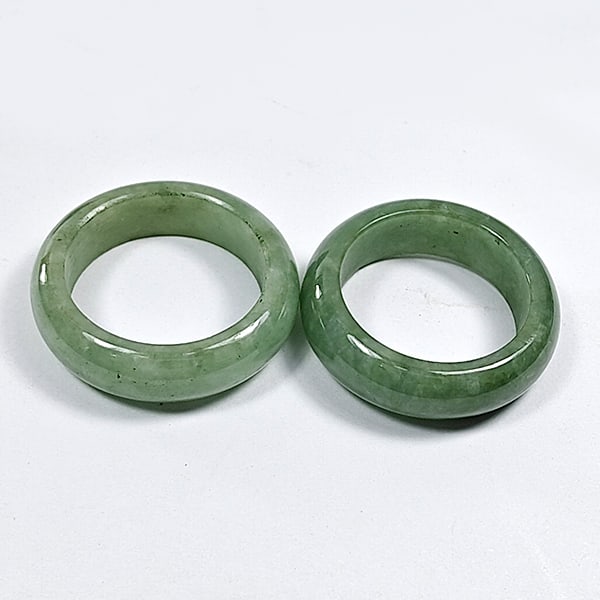 Natural Green Jade Ring 36.20 Ct. 2 Pcs. Size 6.5 Unheated Gemstones: Product ID: 818102653 Product Name: Natural Jade Weight: 36.20 CT. Size: 23 x 17 x 3 MM. Shape: Caving Color: Green White Clarity:Opaque Luster: Good Gems Origin: Thailand Treatment: Unheated Crystal