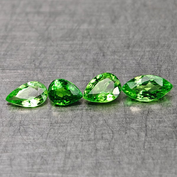 Natural Green Tsavorite Garnet 0.89 Ct. 4 Pcs Mixed Shape 4.6 x 3.5 Mm Gemstones From Tanzania: Product ID: 803005010 Product Name: Natural Tsavorite Weight: 0.89 CT. Size: 4.6 x 3.5 x 1.8 MM. Shape: Mixed Shape Color: Green Clarity:VSI Luster: Very Good Gems Origin: Tanzania Treatment: Unheated