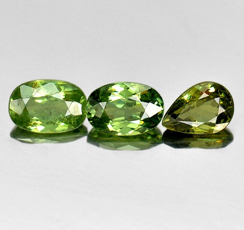 Natural Green Demantoid Garnet 1.80 Ct. 3 Pcs. Mix Shape 6 x 4.2 Mm. Gemstone From Madagascar: Product ID: 802919351 Product Name: Natural Demantoid Weight: 1.80 CT. Size: 6 x 4.2 x 3 MM. Shape: Oval , Pear Color: Green Clarity:SI Luster: Good Gems Origin: Madagascar , Africa Treatment: Unheate