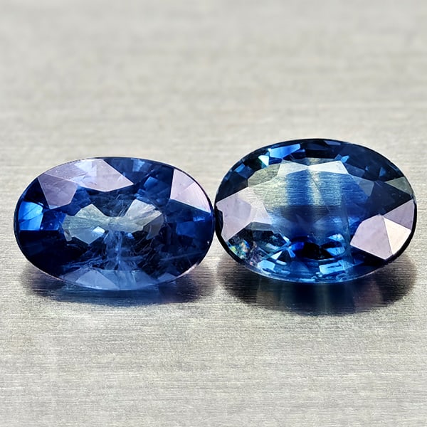 Natural Blue Sapphire 0.86 Ct. 2 Pcs Oval Shape 5.3 x 4.1 Mm Gemstones From Thailand: Product ID: 806012128 Product Name: Natural Blue Sapphire Weight: 0.86 CT. Size: 5.3 x 4.1 x 2.1 MM. Shape: Oval Color: Blue Clarity:VSI Luster: Good Gems Origin: Thailand Treatment: Heated Crystal St