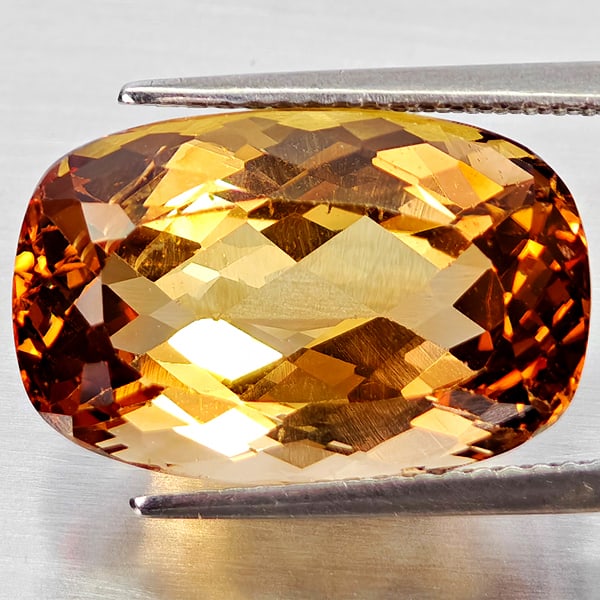 Natural Imperial Topaz 14.15 Ct. Cushion Shape 11.2 x 17.2 Mm. Gemstone From Brazil: Product ID: 805529976 Product Name: Natural Imperial Topaz Weight: 14.15 CT. Size: 11.2 x 17.2 x 8.6 MM. Shape: Cushion Shape Color: Imperial Clarity:VSI Luster: Good Gems Origin: Brazil Treatment: Un