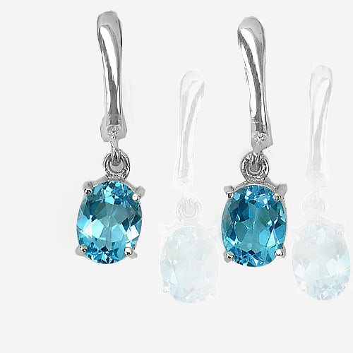 Natural Swiss Blue Topaz 925 Sterling Silver Earrings 4.36 Grams: Product ID: 207102538 Product Type: 925 Sterling Silver Fine Jewelry Jewelry Weight: 4.36 Grams. Gemstones Color: Blue Metal: Solid Silver 92.5%. Gemstone Detail: Round Natural Swiss Blue Topaz Size 9
