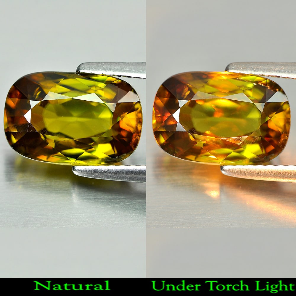 Natural Multi-Color Sphene With Rainbow Spark 3.79 Ct. Cushion Shape 11.3 x 7.6 Mm. Unheated: Product ID: 806508000 Product Name: Natural Sphene Weight: 3.79 CT. Size: 11.3 x 7.6 x 5 MM. Shape: Cushion Color: Multi-Color With Rainbow Spark Clarity:VSI Luster: Adamantine Gems Origin: Madagascar