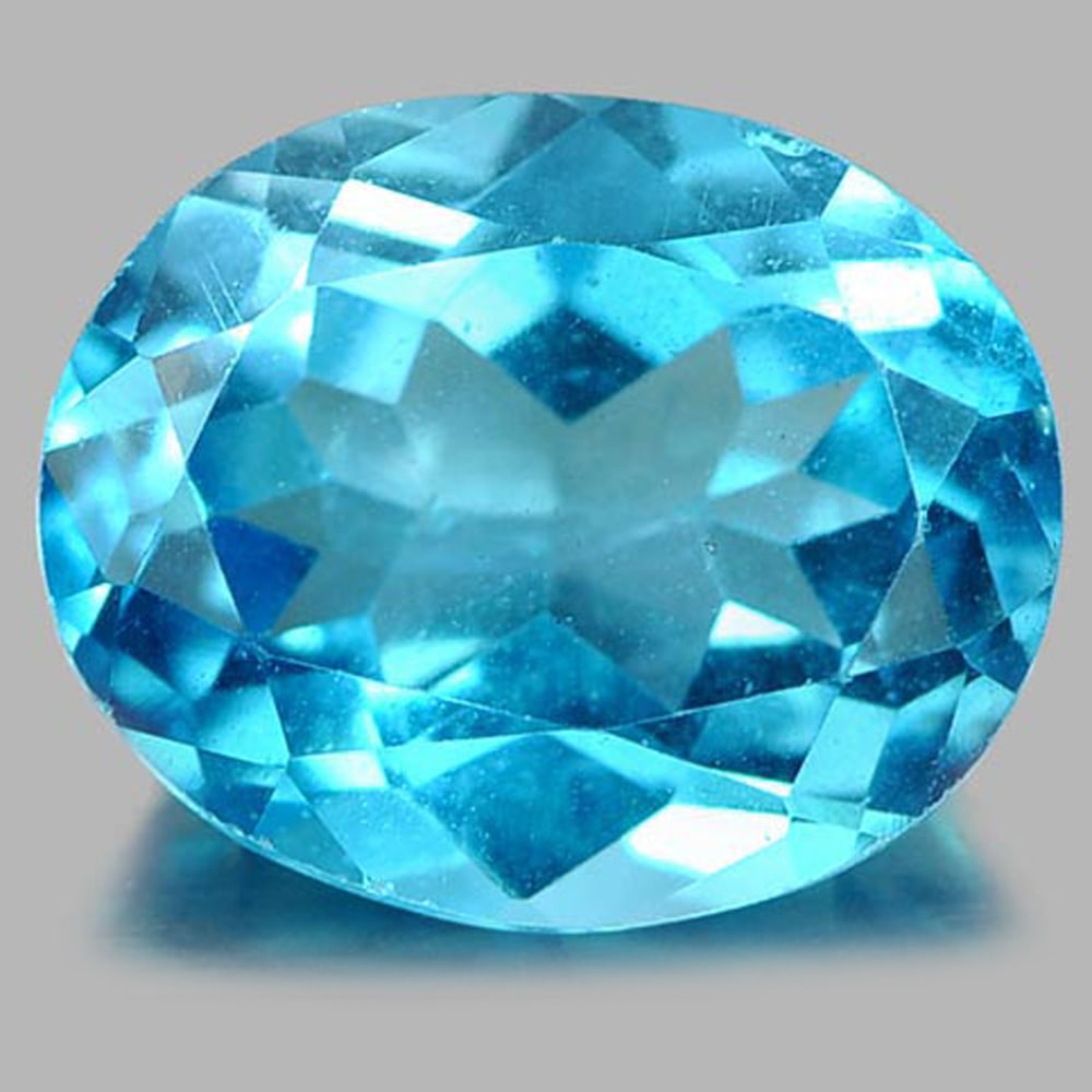 Natural Swiss Blue Topaz 6.11 Ct. Oval Shape 12.2 x 10 Mm. Gemstone From Brazil: Product ID: 807161195 Product Name: Natural Blue Topaz Weight: 6.11 CT. Size: 12.2 x 10 x 6.5 MM. Shape: Oval Color: Blue Clarity:VSI Luster: Good Gems Origin: Brazil Treatment: Treated Crystal Struct