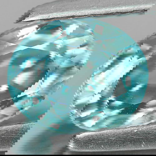 Natural Blue Zircon 0.98 Ct. VVS Oval Shape 6 x 5 Mm. Gemstone From Cambodia: Product ID: 807719512 Product Name: Natural Zircon Weight: 0.98 CT. Size: 6 x 5 x 3.2 MM. Shape: Oval Color: Blue Clarity:VVS Luster: Good Gems Origin: Cambodia Treatment: Heated Crystal Structure: Te