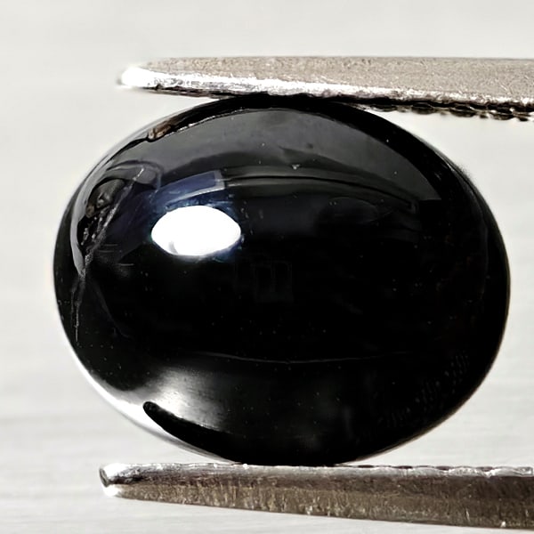 Natural Black Spinel 3.31 Ct. Oval Cabochon Shape 10 x 8.1 Mm Gemstone From Thailand: Product ID: 806609905 Product Name: Natural Spinel Weight: 3.31 CT. Size: 10 x 8.1 x 4.4 MM. Shape: Oval Cabochon Color: black Clarity:Opaque Luster: Good Gems Origin: Thailand Treatment: Unheated Cry
