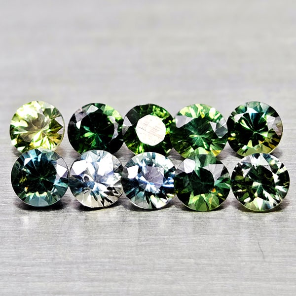 Natural Fancy Color Sapphire 1.39 Ct. 10 Pcs Round Diamand Cut 3.1 Mm Gemstones From Tanzania: Product ID: 806162158 Product Name: Natural Green Sapphire Weight: 1.39 CT. Size: 3.1 x 3.1 x 2 MM. Shape: Round Diamond Cut Color: Fancy Color Clarity:VSI Luster: Very Good Gems Origin: Tanzania Trea