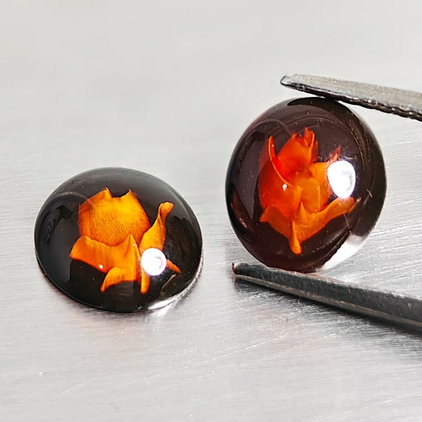 Natural Amber 0.97 Ct. 2 Pcs. Flower Carving In Oval Cabochon Shape 8.7 x 7.5 Mm Gemstones From: Product ID: 819090998 Product Name: Natural Amber Weight: 0.97 CT. Size: 8.7 x 7.5 x 3 MM. Shape: Oval Cabochon Color: Brown Yellow Clarity:Semi - Transparent Luster: Good Gems Origin: Poland Treatmen