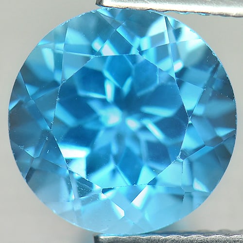 Natural Swiss Blue Topaz 3.66 Ct. VVS Round Shape 9.1 Mm. Gemstone From Brazil: Product ID: 807156262 Product Name: Natural Blue Topaz Weight: 3.66 CT. Size: 9.1 x 9.1 x 6.5 MM. Shape: Round Color: Swiss Blue Clarity:VVS Luster: Good Gems Origin: Brazil Treatment: Treated Crystal