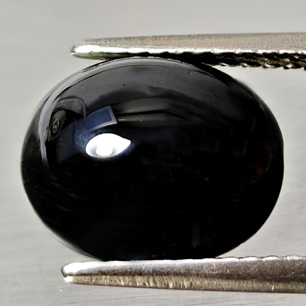Natural Black Spinel 4.80 Ct. Oval Cabochon Shape 11 x 8.9 Mm Gemstone From Thailand: Product ID: 806609902 Product Name: Natural Spinel Weight: 4.80 CT. Size: 11 x 8.9 x 4.8 MM. Shape: Oval Cabochon Color: black Clarity:Opaque Luster: Good Gems Origin: Thailand Treatment: Unheated Cry