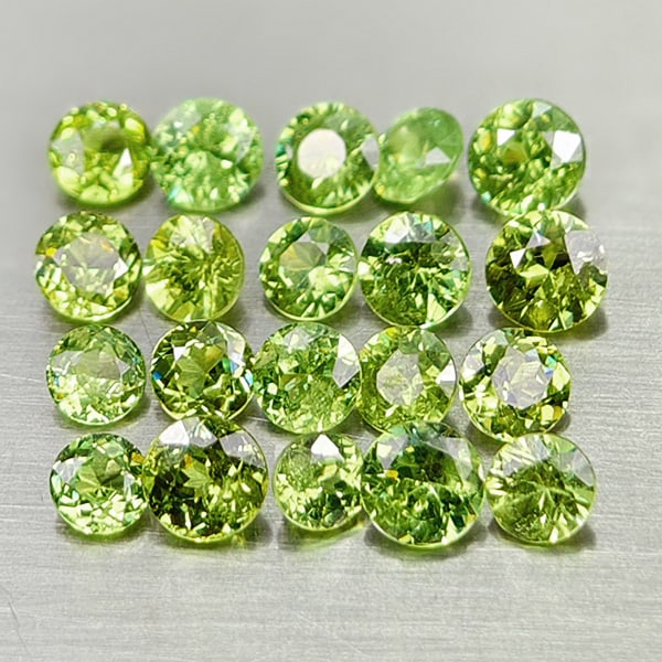 Natural Green Demantoid Garnet 3.06 Ct. 20 Pcs. Round Diamond Cut 3.3 Mm Gemstones From Madagascar: Product ID: 802936435 Product Name: Natural Demantoid Weight: 3.06 CT. Size: 3.3 x 3.3 x 2.3 MM. Shape: Round Diamond Cut Color: Green Clarity:VVS Luster: Good Gems Origin: Madagascar Treatment: Unhea