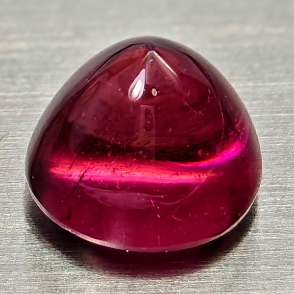 Natural Purplish Pink Rhodolite Garnet 1.14 Ct. Round Cabochon Shape 5.8 Mm Gemstone From Madagascar: Product ID: 802936761 Product Name: Natural Rhodolite Weight: 1.14 CT. Size: 5.8 x 5.8 x 4.7 MM. Shape: Round Cabochon Color: Purplish Pink Clarity:Semi - Transparent Luster: Good Gems Origin: Madagas