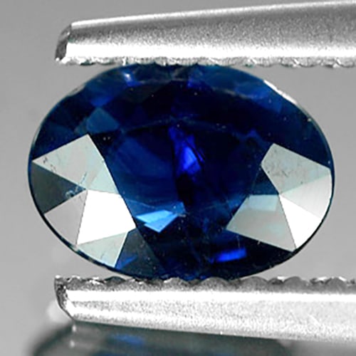 Natural Blue Sapphire 0.63 Ct. Oval Shape 6.4 x 4.7 Mm Gemstone From Thailand: Product ID: 806006220 Product Name: Natural Blue Sapphire Weight: 0.63 CT. Size: 6.4 x 4.7 x 2.4 MM. Shape: Oval Color: Blue Clarity:SI Luster: Good Gems Origin: Thailand Treatment: Heated Crystal Str