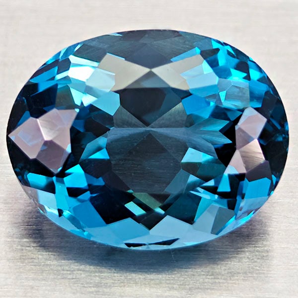 Natural London Blue Topaz 3.82 Ct. Oval Shape 10.2 x 8 Mm Gemstone From Brazil: Product ID: 807168420 Product Name: Natural Blue Topaz Weight: 3.82 CT. Size: 10.2 x 8 x 6 MM. Shape: Oval Color: London Blue Clarity:VVS - VSI Luster: Very Good Gems Origin: Brazil Treatment: Treated
