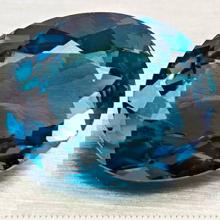 Natural London Blue Topaz 4.62 Ct. Oval Shape 11.8 x 9.8 Mm Gemstone From Brazil: Product ID: 807168407 Product Name: Natural Blue Topaz Weight: 4.62 CT. Size: 11.8 x 9.8 x 5.6 MM. Shape: Oval Color: London Blue Clarity:VVS - VSI Luster: Very Good Gems Origin: Brazil Treatment: