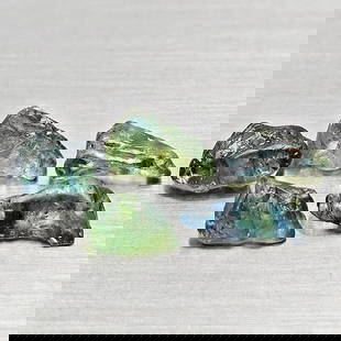 Natural Unheated Greenish Blue Sapphire 4.24 Ct. 5 Pcs Rough Shape Gemstones from Madagascar: Product ID: 806162513 Product Name: Natural Green Sapphire Weight: 4.24 CT. Size: 6.4 x 4.1 x 3.6 to 8.7 x 4.2 x 2.8 MM. Shape: Rough Mixed Shape Color: Greenish Blue Clarity:VSI Luster: Good Gems