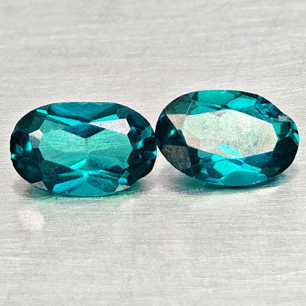 Natural Bluish Green Topaz 1.00 Ct. 2 Pcs Oval Shape 6.2 x 3.9 Mm Gemstones From Brazil: Product ID: 807168081 Product Name: Natural Topaz Weight: 1.00 CT. Size: 6.2 x 3.9 x 2.7 MM. Shape: Oval Color: Bluish Green Clarity:VSI Luster: Good Gems Origin: Brazil Treatment: Treated Crystal Str