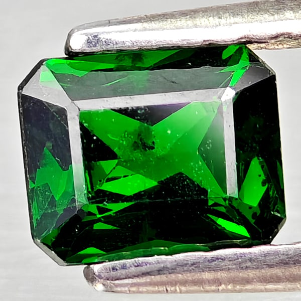 Natural Green Tsavorite Garnet 0.73 Ct. Octagon Shape 5.9 x 4.8 Mm Gemstone From Tanzania: Product ID: 803005066 Product Name: Natural Tsavorite Weight: 0.73 CT. Size: 5.9 x 4.8 x 2.9 MM. Shape: Octagon Color: Green Clarity:SI1 Luster: Good Gems Origin: Tanzania Treatment: Unheated Crystal