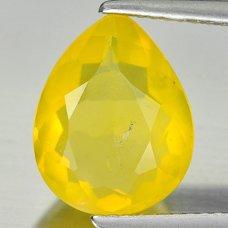 Natural Yellow Opal 2.91 Ct. Pear Shape 12.4 x 9.9 Mm Gemstone From Mexico: Product ID: 818722466 Product Name: Natural Opal Weight: 2.91 CT. Size: 12.4 x 9.9 x 5.7 MM. Shape: Pear Color: Yellow Clarity:Semi - Transparent Luster: Good Gems Origin: Mexico Treatment: Unheated C