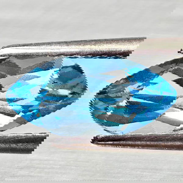 Natural Swiss Blue Topaz 1.27 Ct. Marquise Shape 10 x 4.8 Mm Gemstone From Brazil: Product ID: 807168194 Product Name: Natural Blue Topaz Weight: 1.27 CT. Size: 10 x 4.8 x 3.9 MM. Shape: Marquise Shape Color: Swiss Blue Clarity:VSI Luster: Good Gems Origin: Brazil Treatment: Treated