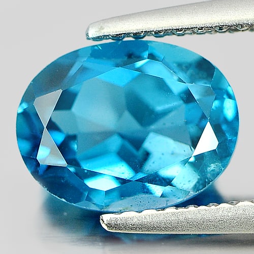 Natural London Blue Topaz 2.41 Ct. Oval Shape 9 x 7 Mm Gemstone From Brazil: Product ID: 807161738 Product Name: Natural Blue Topaz Weight: 2.41 CT. Size: 9 x 7 x 4.8 MM. Shape: Oval Color: London Blue Clarity:VSI Luster: Good Gems Origin: Brazil Treatment: Treated Crystal Str