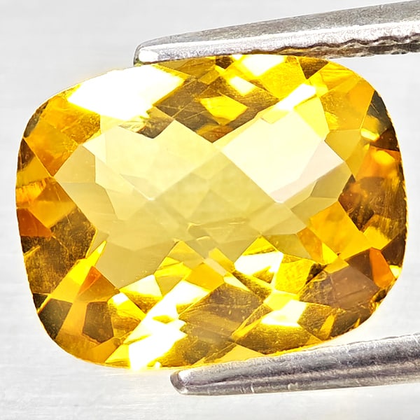 Natural Yellow Citrine 2.47 Ct. Cushion Checkerboard Cut 10.2 x 8.1 Mm Gemstone From Brazil: Product ID: 801815236 Product Name: Natural Citrine Weight: 2.47 CT. Size: 10.2 x 8.1 x 5.2 MM. Shape: Cushion Checkerboard Cut Color: Yellow Clarity:VVS - VSI Luster: Good Gems Origin: Brazil Treatme