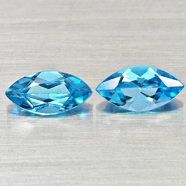 Natural Swiss Blue Topaz 2.68 Ct. 2 Pcs Marquise Shape 10.2 x 5.2 Mm Gemstones From Brazil: Product ID: 807168181 Product Name: Natural Blue Topaz Weight: 2.68 CT. Size: 10.2 x 5.2 x 4.1 MM. Shape: Marquise Shape Color: Swiss Blue Clarity:VSI Luster: Good Gems Origin: Brazil Treatment: Treat