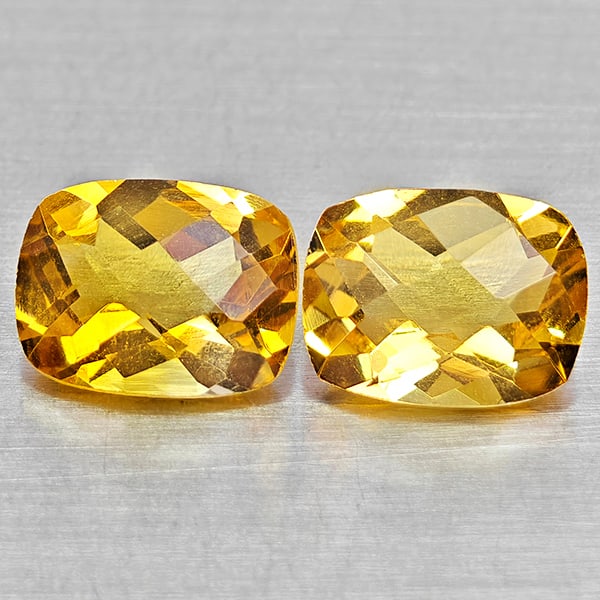 Natural Yellow Citrine 2.64 Ct. 2 Pcs Cushion Checkerboard Cut 8.2 x 6.3 Mm Gemstones from Brazil: Product ID: 801815257 Product Name: Natural Citrine Weight: 2.64 CT. Size: 8.2 x 6.3 x 4.3 MM. Shape: Cushion Checkerboard Cut Color: Yellow Clarity:VVS - VSI Luster: Good Gems Origin: Brazil Treatmen