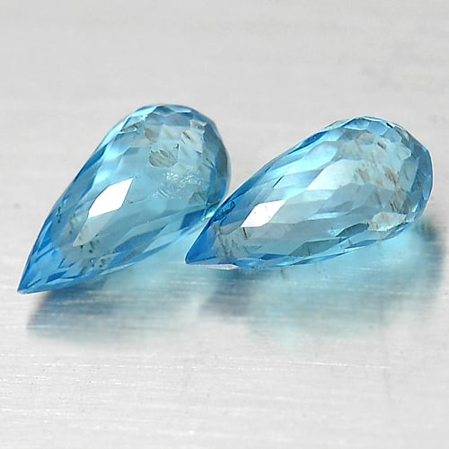 Natural Blue Topaz 1.70 Ct. 2 Pcs Briolette Shape 7.4 x 3.8 Mm Gemstone From Brazil: Product ID: 807151349 Product Name: Natural Blue Topaz Weight: 1.70 CT. Size: 7.4 x 3.8 x 3.8 MM. Shape: Briolette Color: Blue Clarity:VVS Luster: Good Gems Origin: Brazil Treatment: Treated Crystal S