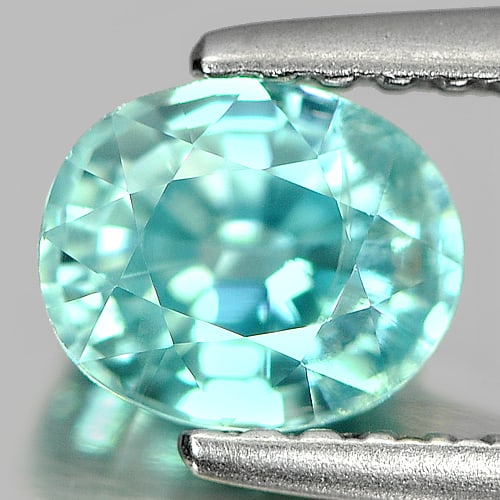 Natural Blue Color Zircon 1.22 Ct. Oval Shape 6.2 x 5.1 Mm Gemstone From Cambodia: Product ID: 807711759 Product Name: Natural Zircon Weight: 1.22 CT. Size: 6.2 x 5.1 x 3.8 MM. Shape: Oval Color: Blue Clarity:SI Luster: Good Gems Origin: Cambodia Treatment: Heated Crystal Structure: