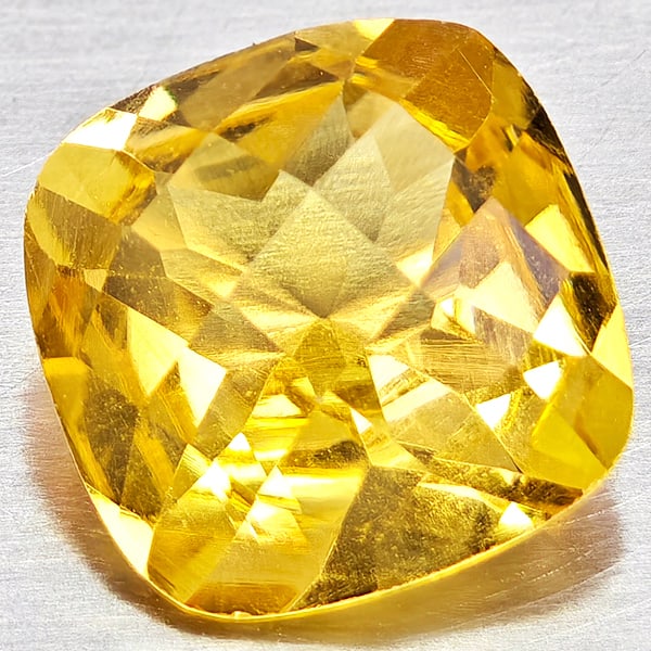 Natural Yellow Citrine 1.86 Ct. Cushion Checkerboard Cut 8.2 x 8.2 Mm Gemstone From Brazil: Product ID: 801815316 Product Name: Natural Citrine Weight: 1.86 CT. Size: 8.2 x 8.2 x 5 MM. Shape: Cushion Checkerboard Cut Color: Yellow Clarity:VVS - VSI Luster: Good Gems Origin: Brazil Treatment: