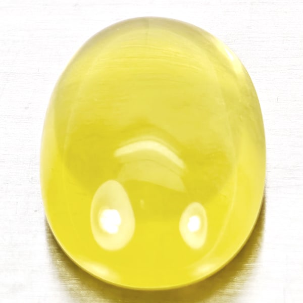 Natural Yellow Lemon Quartz 16.88 Ct. Oval Cabochon Shape 19 x 13.8 Mm Gemstone from Brazil: Product ID: 805530030 Product Name: Natural Quartz Weight: 16.88 CT. Size: 19 x 13.8 x 9.1 MM. Shape: Oval Cabochon Color: Yellow Lemon Clarity:Semi - Transparent Luster: Good Gems Origin: Brazil Trea